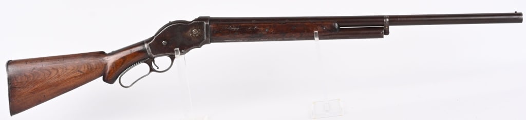 ANTIQUE WINCHESTER 1887 LEVER ACTION SHOTGUN: SERIAL NUMBER: 52001. BARREL: 28". CALIBER: 10 GAUGE. MANUFACTURED: 1893. Standard markings on the frame, and the bottom of the tang. Barrel likely cut back to 28" and a brass bead front sight was add