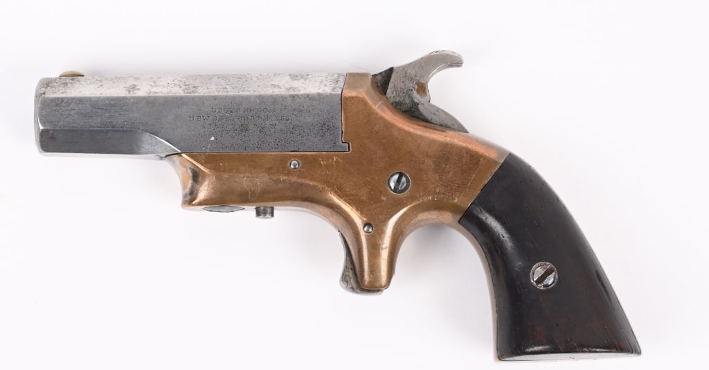 BROWN MANUFACTURING SOUTHERNER DERRINGER: SERIAL NUMBER 3634 BARREL 2 1/2" CALIBER .41 RIM FIRE MANUFACTURED 1966-73. Brass frame with octagon barrel. Spur trigger single shot with top barrel flat marked :SOUTHERNER" Left side of chamber mark