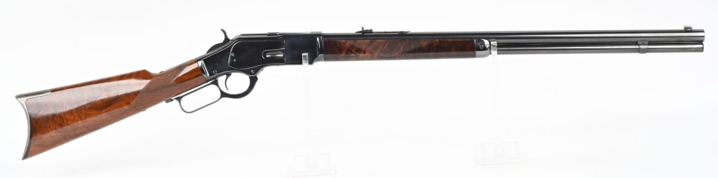 WINCHESTER 2ND MODEL 1873 RIFLE CALIBER 44-40: SERIAL NUMBER 89904 BARREL 24" CALIBER 44-40 WCF MANUFACTURED 1882. Manufactured with round barrel with 2 line Winchester New Haven barrel address. Blue finished with high figured varnished checkered 