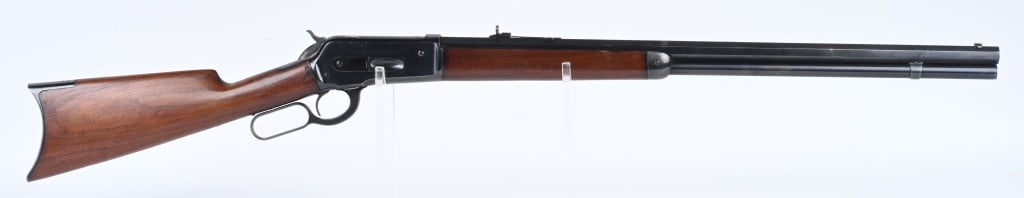 WINCHESTER MODEL 1886 LEVER ACTION RIFLE - 1891: SERIAL 63573. BARREL 26". CALIBER 45-70. MADE IN 1891. Features full octagon barrel & tube, original sporting sights, walnut stocks, rifle butt plate. Condition. Retains about 95% of the reblued finis