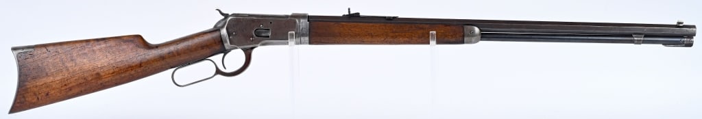 WINCHESTER MODEL 1892 TAKE DOWN RIFLE: SERIAL 497656. BARREL 24". CALIBER 25-20. MADE IN 1909. Full octagon barrel & tube, original sporting sights, take down, blue finish, walnut stocks, rifle butt plate. Condition. Frame is soft gray. Ba