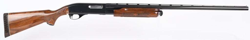 REMINGTON MODEL 870 WINGMASTER MAGNUM 12 GAUGE: SERIAL NUMBER: T757071M. BARREL: 30". CALIBER: 12 GAUGE. MANUFACTURED: 1977. Standard markings and features of a magnum receiver gun. Full vent rib barrel with bead front sight. Original blued finish,