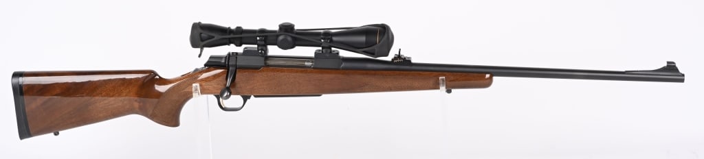 BROWNING A-BOLT .270 WIN WITH LEUPOLD SCOPE: SERIAL NUMBER: 09627NY717. BARREL: 22". CALIBER: .270 WIN. MANUFACTURED: 1992. Made in Japan. Hinged floor plate. Ramped blade front sight and Williams u-notch rear. Matte blued finish and gloss finis