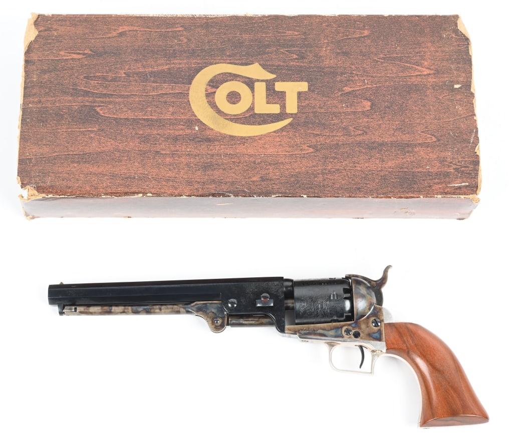 BOXED 2ND GEN COLT 1851 NAVY REVOLVER: SERIAL 22406. BARREL 7.5". CALIBER 36. MADE IN 1976. Finest 1851 Navy since the 19th century. Beautiful early Colt case colors and blue, naval scene on cylinder, one piece oil finish walnut grips, pla