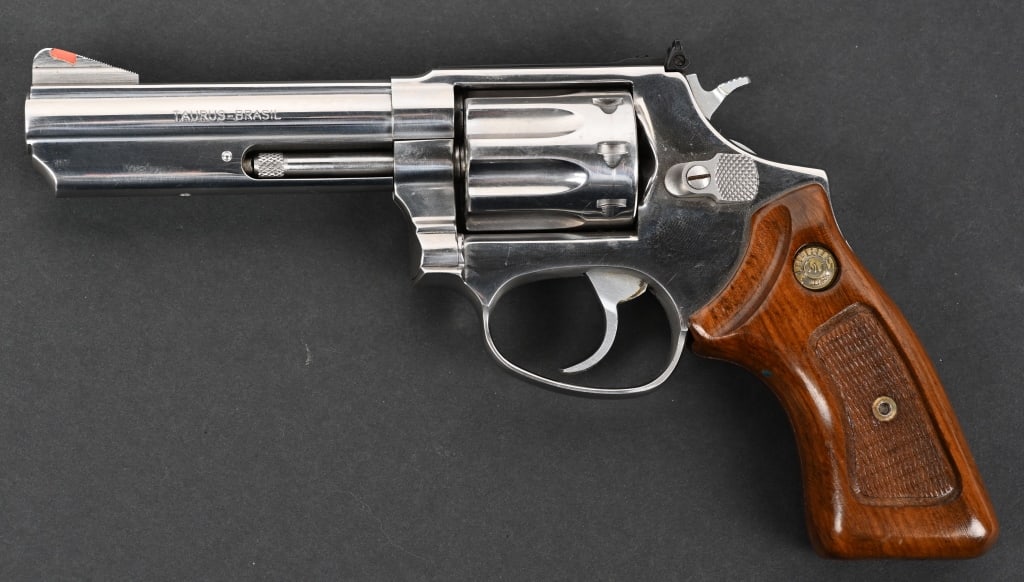 TAURUS MODEL 941 DOUBLE ACTION REVOLVER .22 MAG: SERIAL NUMBER: 0E65073. BARREL: 4". CALIBER: .22 MAGNUM. MANUFACTURED: 2000S. Made in Brazil, with standard markings and features. 8 shot fluted cylinder. Factory ramped blade front sight and adjustab
