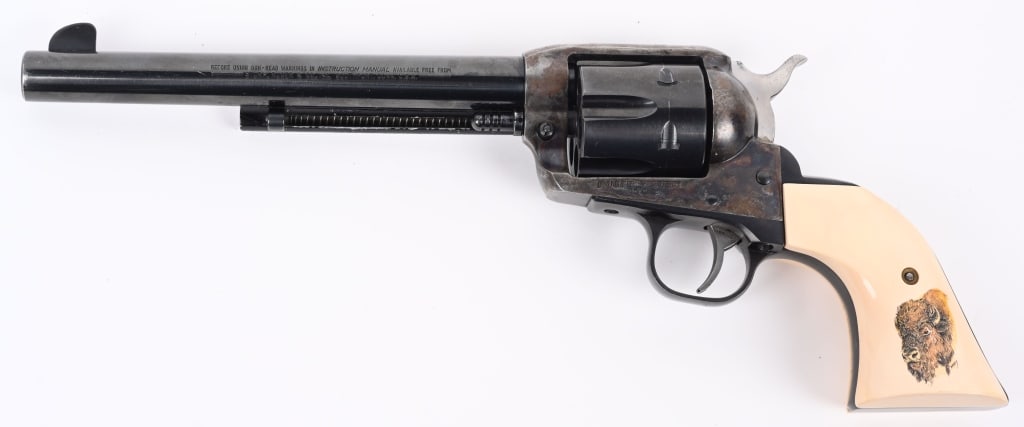 RUGER VAQUERO SINGLE ACTION REVOLVER .45 COLT: SERIAL NUMBER: 55-17808. BARREL: 7-1/2". CALIBER: .45 COLT. MANUFACTURED: 1994. Standard markings and features. Six shot fluted cylinder. Blade front sight and simple u-notch rear. Factory blued barre
