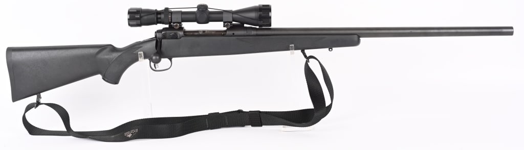 SAVAGE MODEL 110 BOLT ACTION RIFLE .300 WIN MAG: SERIAL NUMBER: G341883. BARREL: 24". CALIBER: .300 WIN MAG. MANUFACTURED: 2000S. Standard markings and fixed magazine. Heavy barrel with scope blocks on the receiver and a Simmons Classic 3.5-10X40. A