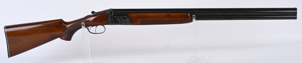 ITALIAN MADE MAUSER MODEL 71E O/U SHOTGUN: SERIAL NUMBER: 33461. BARREL: 28-1/2". CALIBER: 12 GAUGE. MANUFACTURED: 1970. Made in Italy for Mauser, and imported by the Bauer corporation in Michigan. Matching serials. Standard Italian proofs. Ve