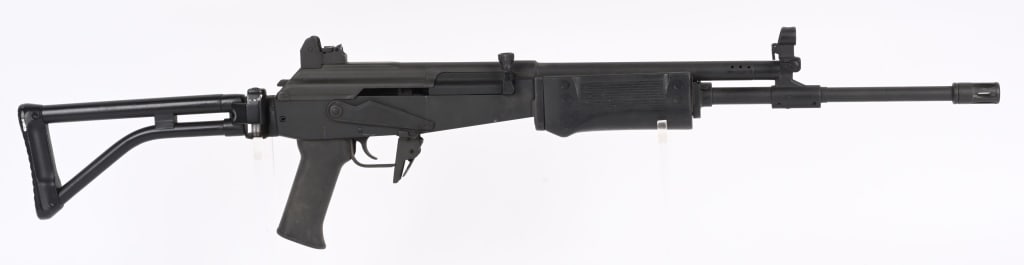 CENTURY ARMS GOLANI SPORTER SEMI AUTO RIFLE: SERIAL NUMBER: GAL02049. BARREL: 18". CALIBER: .223 REM. MANUFACTURED: 2000S. Century Arms receiver, and built using surplus parts. Full cage flash hider. Post front sight and adjustable rear. Flip up