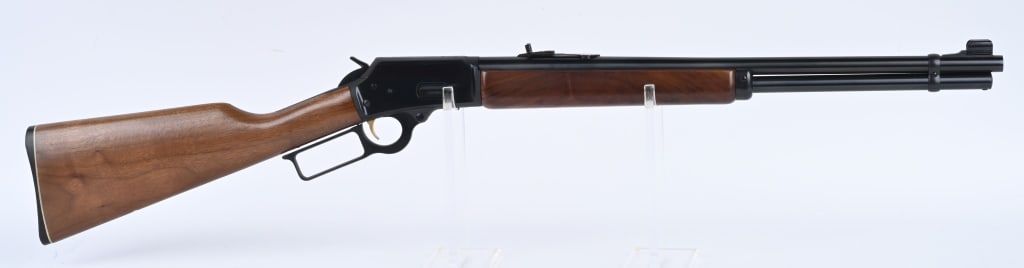 MARLIN MODEL 1894 CARBINE 44 MAGNUM: SERIAL 22010924. BARREL 20". CALIBER 44 MAG. Full tube, blue finish, original sporting sights, walnut stock with bulls eyes and Marlin plastic butt plate. Condition. 99% with very minor handling. Bore