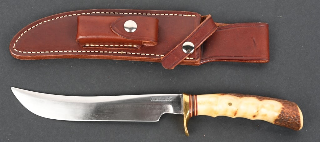 VINTAGE RANDALL MODEL 4 BIG GAME SKINNER WITH STAG: Early Randall Model 4 Big Game Skinner with 7" carbon steel blade, Randall touch mark on left ricasso. Finger groove Sandbar stag handle with single brass guard. Housed in a contemporary Sullivan scab