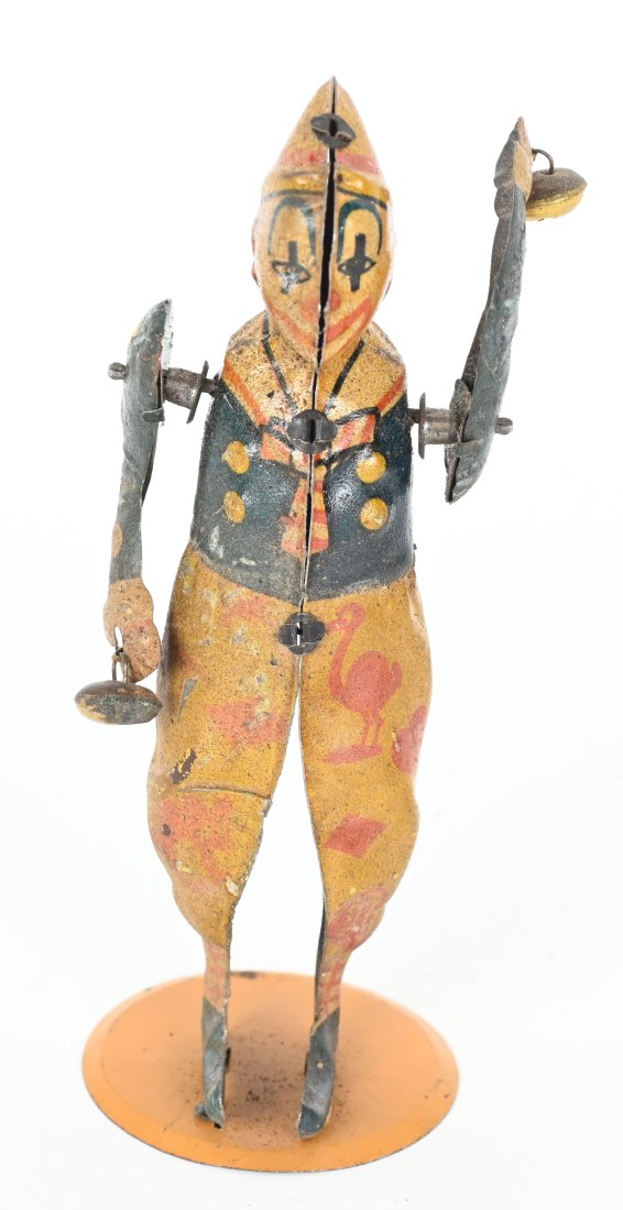 GERMAN TIN WINDUP CLOWN WITH BELLS (1 of 4)