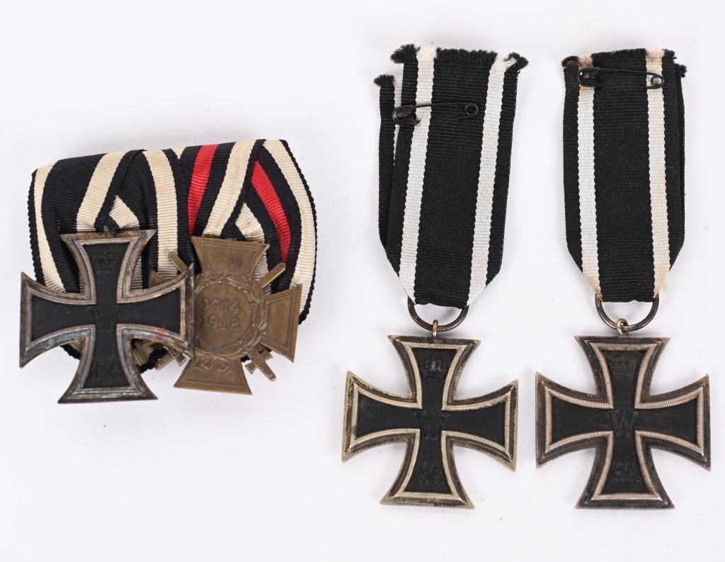 WWI IMPERIAL GERMAN IRON CROSS LOT W MEDAL BAR: Lot of German medals to include 1) IRON CROSS 2ND CLASS.1914 pattern, die struck, three piece, iron and alloy construction Patt?e style cross with a single piece iron core and two piece silver alloy f