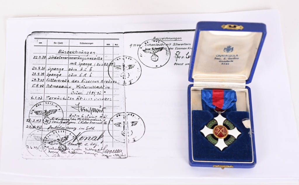 MILITARY ORDER OF SAVOY KNIGHT'S BREAST CROSS: Italian Military Order of Savoy, Knight?s Breast Badge in silver gilt and enamels, 37mm x 39mm, unmarked, WW1 period issue, no chipping to enamels, in extremely fine condition. Comes with original iss