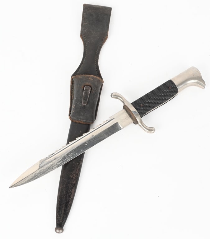 WWII NAZI GERMAN FIRE POLICE SAWTOOTH BAYONET WW2: Drop forged 7 3/4" long, bright nickel/silver plated steel blade with wide fuller to each side. Blade is in overall very good condition and is the sawtooth variety. Maker marker to Eickhorn. Brown lea