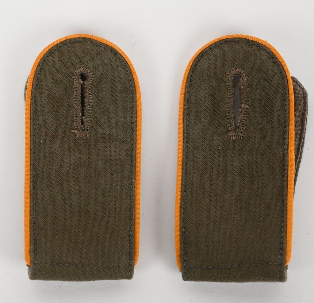 WWII NAZI CAVALRY TROOP TROPICAL SHOULDER STRAPS: Pair of matching Heer tropical slip on EM shoulder boards, Cavalry branch of service, correct early brown wool backing and tropical shirt fabric to the inside of tongues. Hard to find.?On November 26T