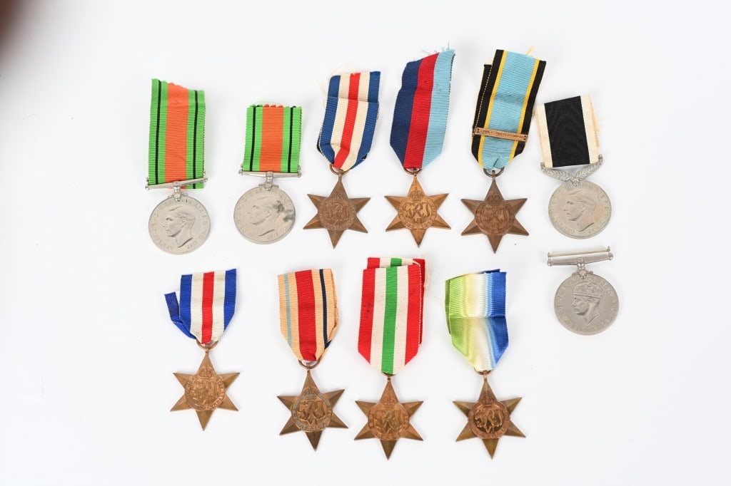 WWII BRITISH COMMONWEALTH BATTLE STAR MEDAL LOT: British medal lot to include 1) BRITISH COMMONWEALTH AFRICA STAR MEDAL. The medal takes the form of a, bronze colored, six-pointed tombac star, 38mm from point to point, whose uppermost poin