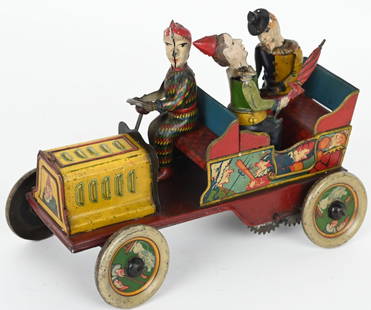 HANS EBERL TIN WINDUP TA-RA-RA-BUMM CLOWN CAR: German tin windup Ta-Ra-Ra-Bumm Clown Car. All original and complete. Toy has nice colors and graphics. Windup works and clowns all moved. Nice example of this desirable toy. 7" Excellent