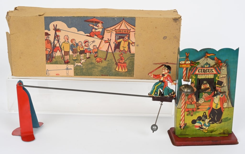 GERMAN TIN WINDUP CLOWN ON TIGHT ROPE w/ BOX (1 of 6)