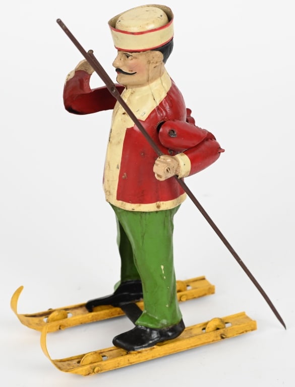 GERMAN HAND PAINTED TIN W/U MAN ON SKIS (1 of 4)