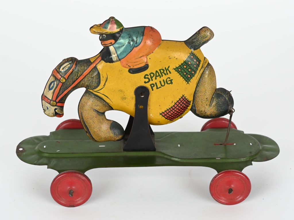 NIFTY SUNSHINE ON SPARK PLUG PULL TOY (1 of 4)