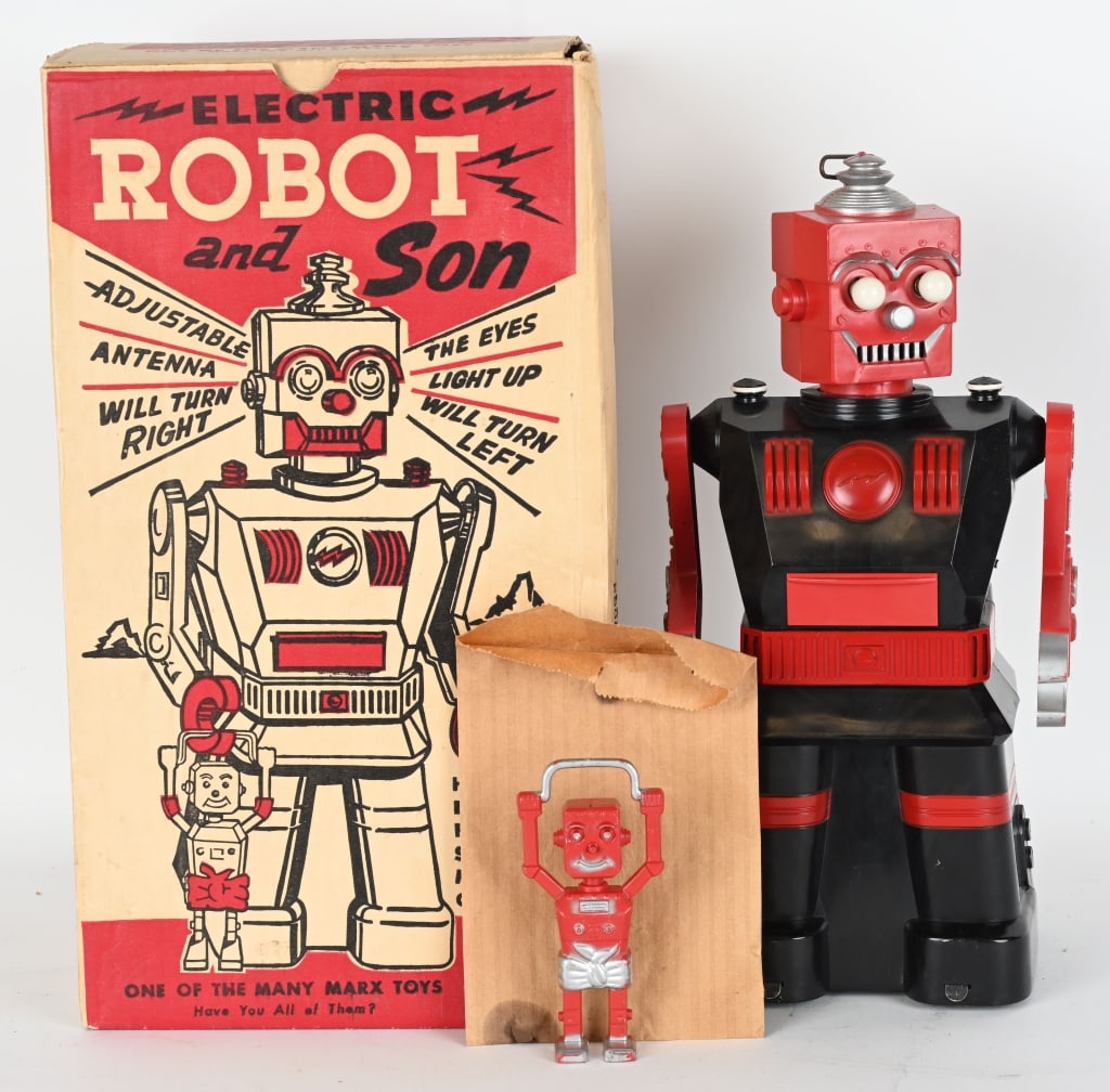 MARX BATTERY OP ROBOT & SON w/ BOX: The toy is nice condition and is complete. Includes tools and the son that has the original bag. The box is very nice. Did not work when tested. A very nice example. 14 1/2" Excellent