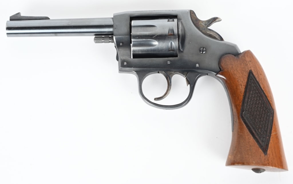IVER JOHNSON TARGET SEALED 8 DA REVOLVER: SERIAL NUMBER: M99754. BARREL: 4". CALIBER: .22LR. MANUFACTURED: 1940S. Standard markings on the top of the frame. Previous owners Social Security number scratched onto the front grip strap. Blade fro
