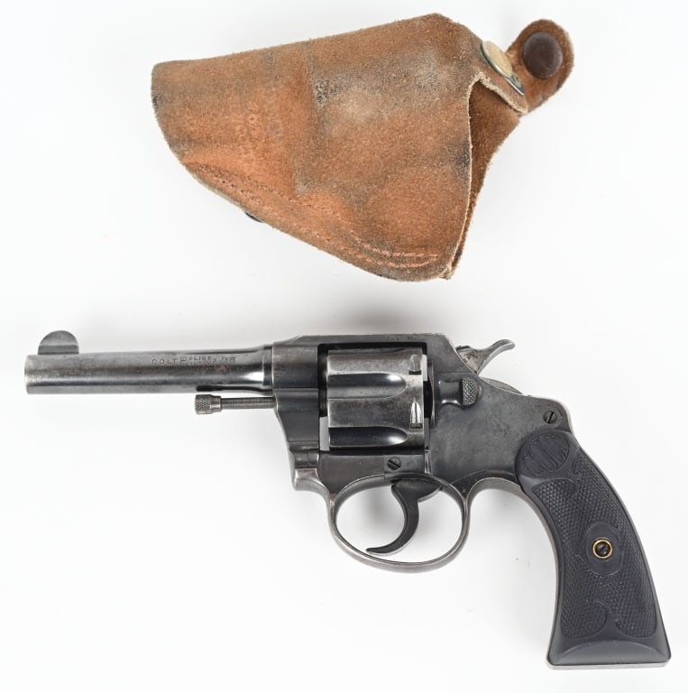 COLT POLICE POSITIVE DA REVOLVER: SERIAL NUMBER: 102176. BARREL: 4". CALIBER: .38 S&W. MANUFACTURED: 1919. Standard markings and six shot fluted cylinder. Half moon front sight and u-notch rear. Factory blued finish. Grips are later p