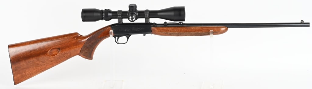 BELGIUM BROWNING SEMI AUTO .22 RIFLE: SERIAL NSN. BARREL 20". CALIBER 22 LR. Early example with wheel rear sight, take down, blue finish, engraved frame, checkered pistol grip walnut stock, Barska 9x scope that has standard cross hairs an