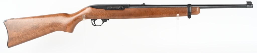 RUGER 10/22 SEMI AUTO CARBINE: SERIAL 232-08019. BARREL 18.5" CALIBER 22LR. Rotary magazine (included), plain pistol grip walnut stock, single barrel band, folding leaf rear sight, carbine butt plate. Condition. 98% overall with li