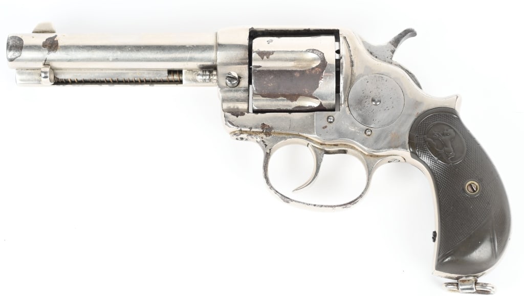 COLT MODEL 1878 DA REVOLVER: SERIAL 16423. BARREL 4 3/4". CALIBER .44-40. MADE 1886. Barrel has been shortened with reapplied nickel finish. Grips are original gutta percha. Lanyard ring intact. Condition. Caliber etching no long