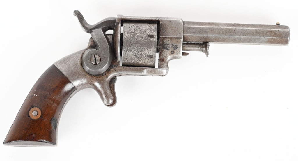 ALLEN & WHEELOCK 22 SIDEHAMMER POCKET REVOLVER: SERIAL NSN. BARREL 3". CALIBER .22RF. 1858-1862. Octagon barrel, spur trigger, side hammer, walnut grips, roll die cylinder. Condition. Smooth patina overall, nice cylinder scene, sharp barrel address