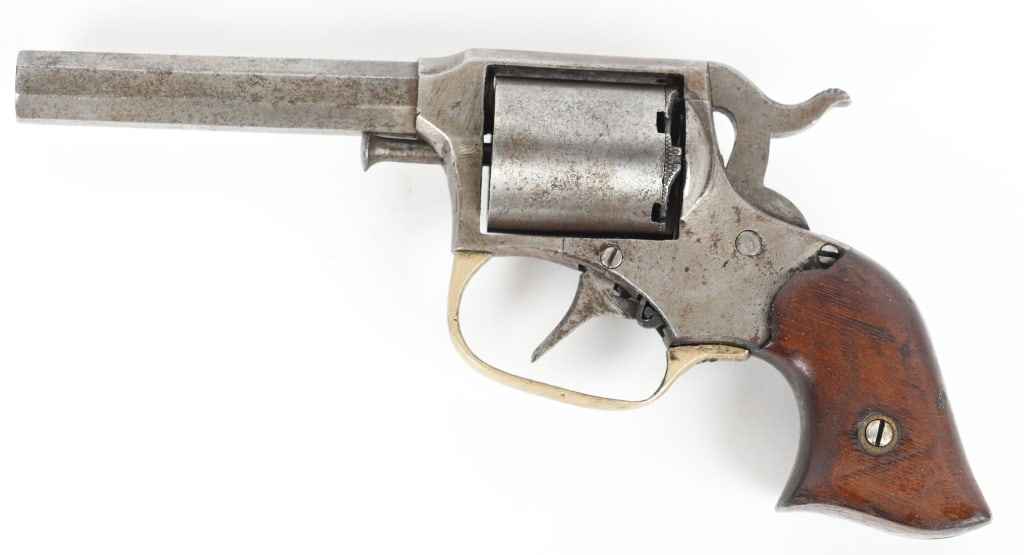REMINGTON RIDER CARTRIDGE POCKET REVOLVER: SERIAL 7641. BARREL 3". CALIBER 32RF. 1860-1873. Cartridge conversion, octagon barrel, 5-shot, double action, walnut grips. Condition. All gray patina, sharp barrel address, excellent grips, missing f