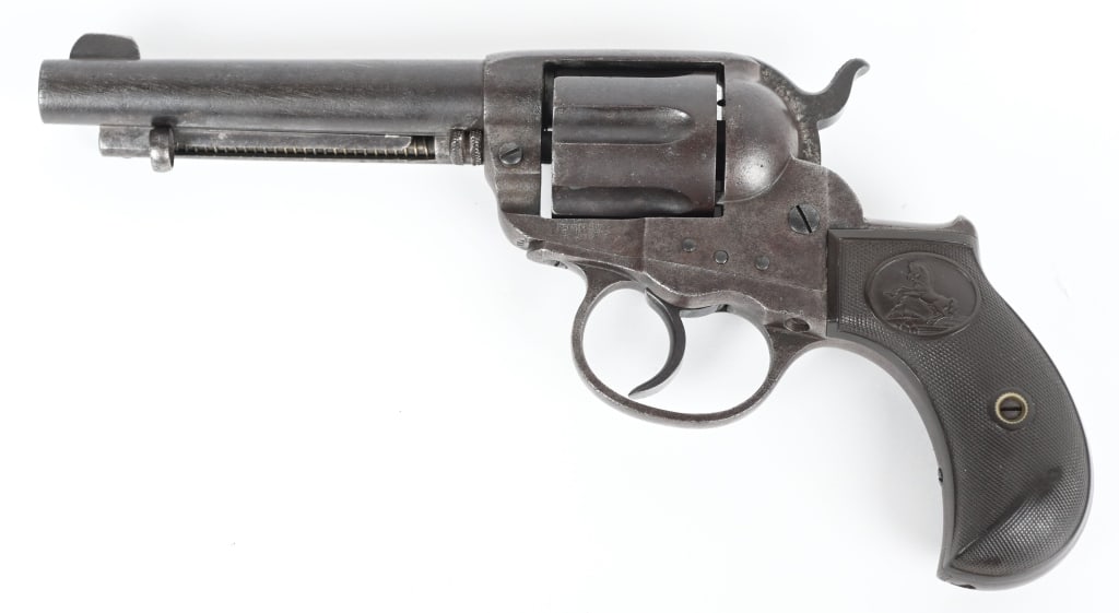 COLT MODEL 1877 LIGHTNING 38 REVOLVER: SERIAL 108747. BARREL 4.5". CALIBER .38 COLT. MADE 1898. Standard blue and case color finish with gutta percha grips. Condition. Flashes of blue on the barrel, balance of gun is smooth patina .with vi