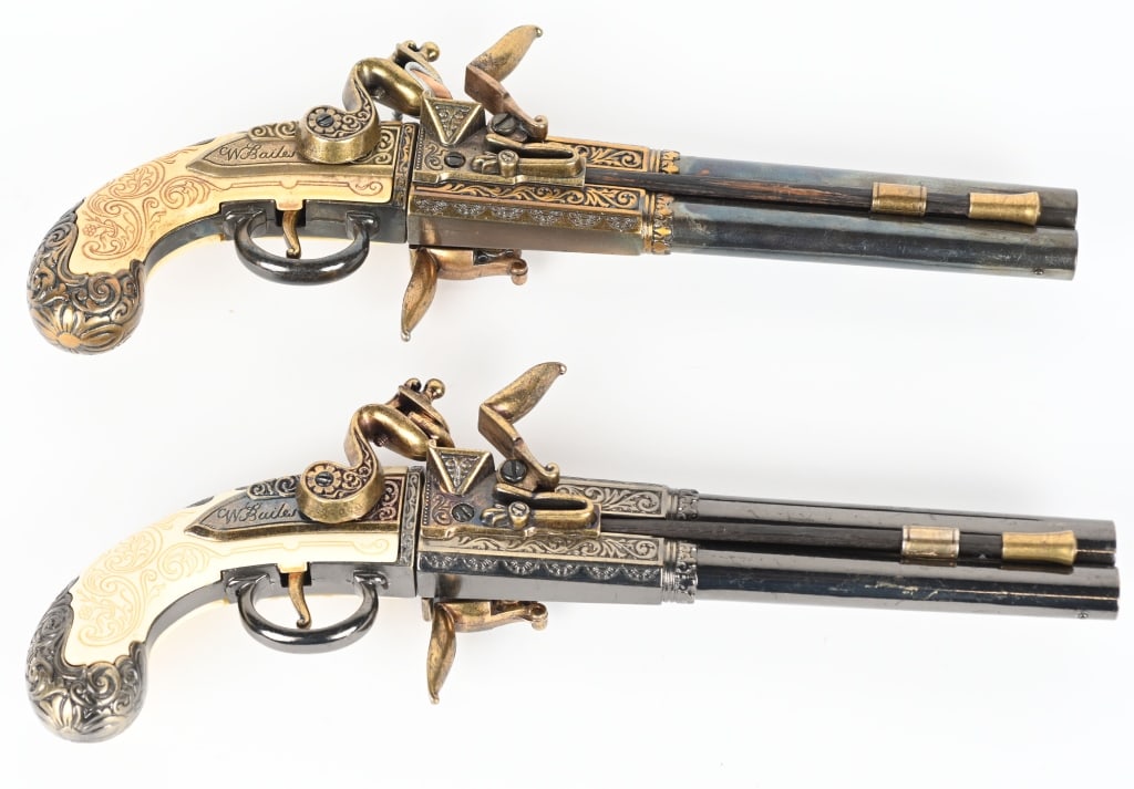 LOT OF 2: SWIVEL BREECH NON FIRING DISPLAY PISTOLS: Lot of 2, ornate swivel breech flintlock display/non firing pistols. Both look to be Belgian made, "tourist" style pistols. Working actions, but barrels have screws drilled in the sides. CONDITION: Bo