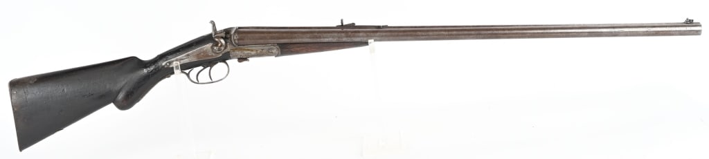 W. RICHARDS SXS COMBO GUN: NSN. BARRELS 30". CALIBER / GAUGE 40? / 12. CHAMBERS 2 5/8". CHOKE MOD. LOP 13.5". Rifle shotgun side by side, rifle sights, double triggers , exposed hammers, round knob walnut stock, splinter forear