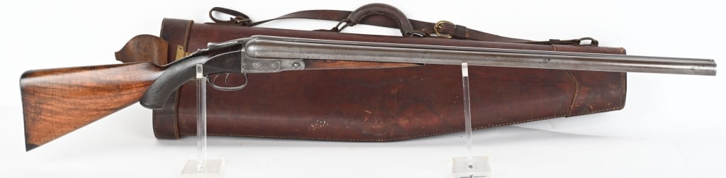 ANTIQUE PARKER E GRADE HAMMERLESS 10 GA SXS: SERIAL 56143. BARRELS 30". GAUGE 10 CHAMBER 2 5/8" MADE IN 1889. Features Damascus barrels, hammerless, engraved frame stamped "E" , double triggers, checkered pistol grip walnut stock with cap, skele