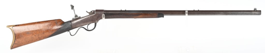 MARLIN BALLARD SINGLE SHOT RIFLE: SERIAL 3130. BARREL 28". CALIBER .22. Full octagon barrel not cut for rear sight, tapped for tube scope, tang peep sight, checkered walnut forearm with black tip, checkered straight grip stock with ro