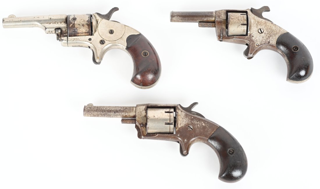 LOT (3) ANTIQUE SPUR TRIGGER REVOLVERS: All retain about 50-60% nickel finish with wood bird head grips. A. COLT OPEN TOP 22. Working, excellent grips. B. DEFENDER 22, Not working. C. LITTLE GIANT 22, Working. SOLD AS IS , ANTIQUE ,DB