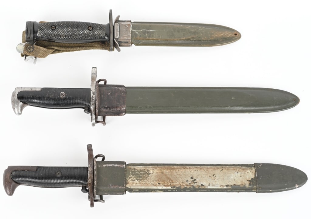 COLLECTORS LOT OS 3 US MILITARY BAYONETS: (1) AFH (American Fork & Hoe) mfg M1 bayonet for 1903 / M1 rifle with US green fiber scabbard . 10" blade with 2 piece blade handles, Good WW2 period condition. (2) Model 1905E1 UFH 10" bayonet for 19