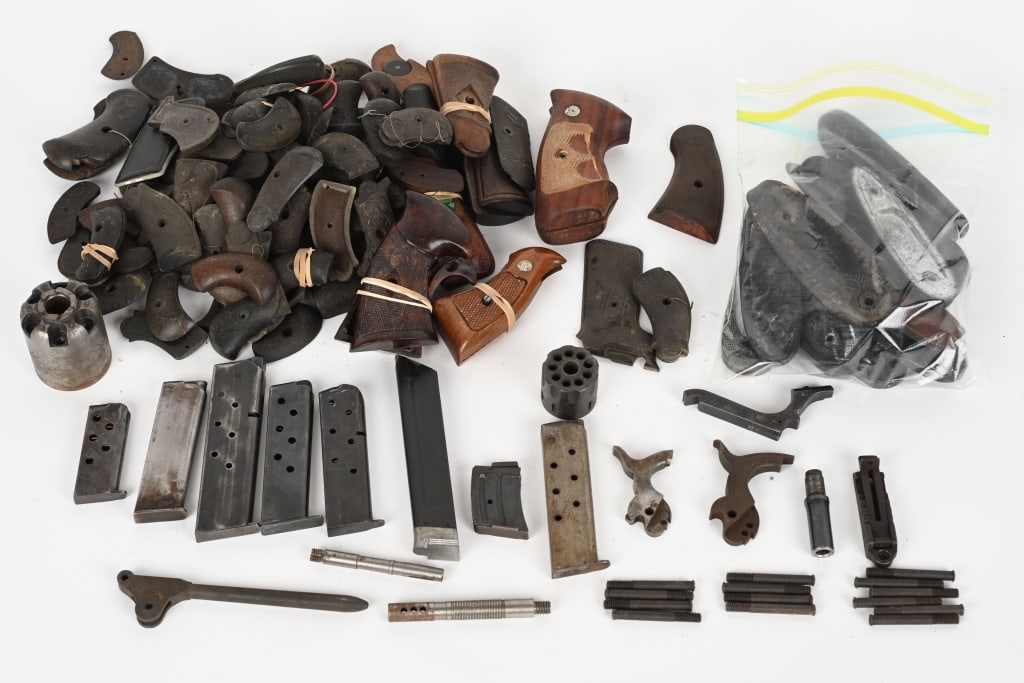 HUGE LOT GRIPS, BUTT PLATES REVOLVER PARTS: BUTTPLATES; WIN, REM, ITHACE, SEARS, ETC GRIPS . mostly small derringer types MAGAZINES . 8 TOTAL INC WIN HAMMERS . TWO Two cylinders, small parts, rear rifle sight, etc. Way too many parts to detail.
