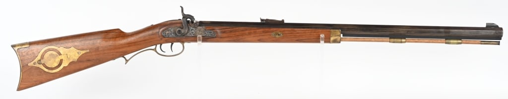 SILE HALF STOCK HAWKEN STYLE PLAINS RIFLE: SERIAL 81913. BARREL 29". CALIBER 50 PERCUSSION. Blue octagon barrel, target rear sight, wood rod, case color lock, set triggers, brass furniture inc. patch box , walnut half stock Condition. 60% blue