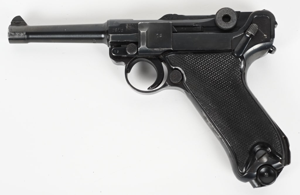 WW2 GERMAN MAUSER BYF 42 CODE BLACK WIDOW LUGER: SERIAL NUMBER: 7813f. BARREL: 4". CALIBER: 9MM LUGER. MANUFACTURED: 1942. "42" dated chamber and "byf" marked toggle. "P.08" marked left side of the frame. "eagle/135" Waffenamnts on the left side of 