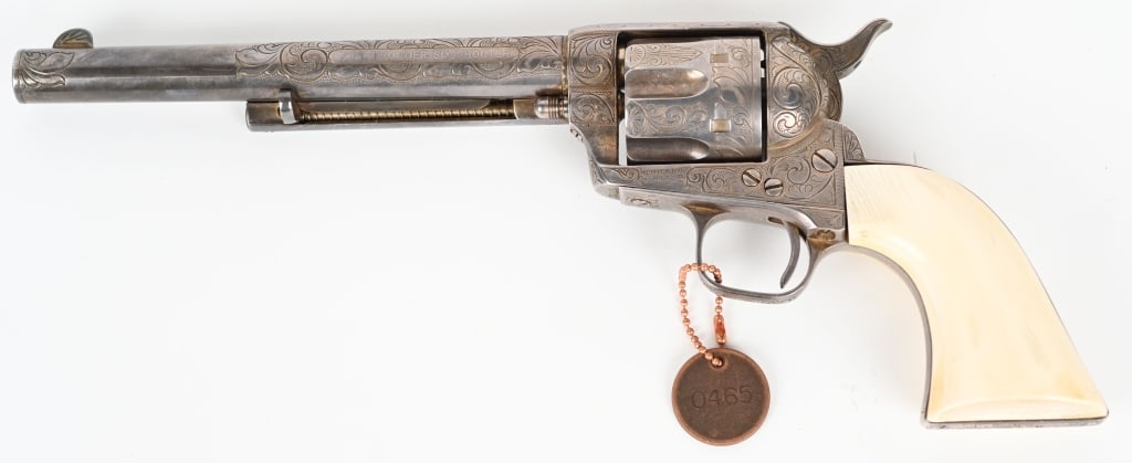 ENGRAVED COLT FRONTIER SIX SHOOTER WITH IVORYS: SERIAL NUMBER: 72141. BARREL: 7-1/2". CALIBER: .44-40. MANUFACTURED: 1881. "COLT FRONTIER SIX SHOOTER" etched panel on the left side of the barrel. Single line company address on the barrel. "44" mark