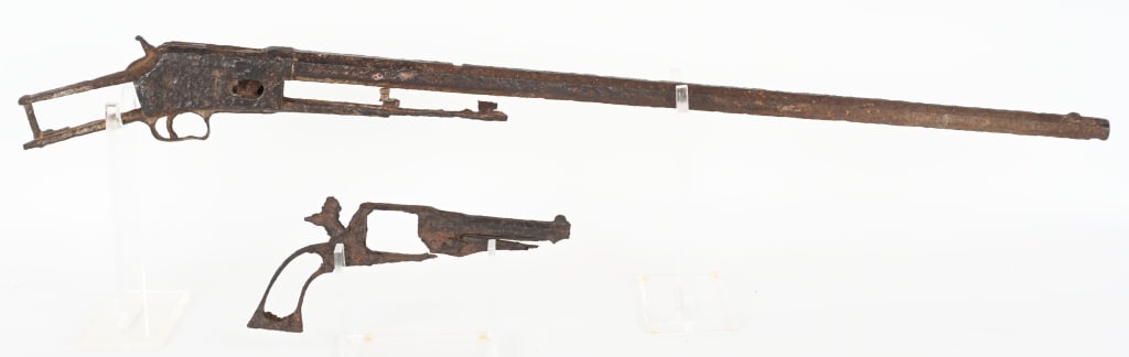 PAIR OF FRONTIER EXCAVATED RIFLE & PISTOL FROM MT: A pair of excavated firearms from Northern Montana, A Colt medium frame lightning pump rifle with octagon barrel & a Remington Pocket model revolver. Both Excavated from a sight in Northern Montana. I