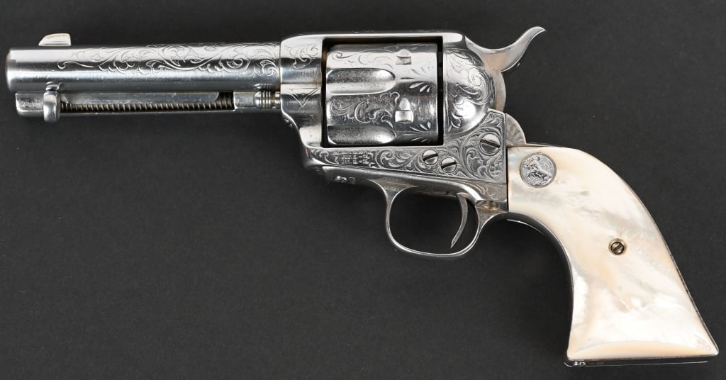 NEW YORK ENGRAVED COLT SAA - 1883: Factory letter states gun was shipped to Hartley & Graham of New York as soft (to be engraved by them) with barrel length not listed which usually means 7 1/2". It is now a 4 3/4" gun with single line