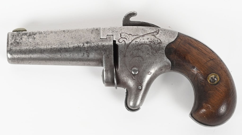 COLT SECOND MODEL DERINGER: SERIAL NUMBER 833 BARREL 2 1/2" CALIBER .41 Rim Fire, MFG 1870-1890. Serial numbers match on barrel and frame. Two line Colt's Hartford address on barrel. CONDITION, Smooth metal with good markings. B