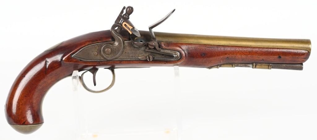 KETLAND FLINTLOCK BRASS BARREL PISTOL: BARREL 8" CALIBER .60. This handsome pistol features a one piece stock, brass barrel and brass hardware. Barrel is marked London on top with English proofs at breech. The lock is marked Ketland & Co. 