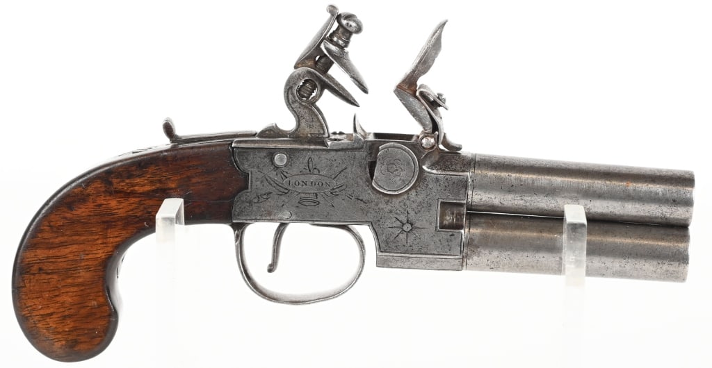 TWIGG FLINTLOCK OVER / UNDER PISTOL: BARRELS 2 1/2" CALIBER .45. Pistol features over and under screw off barrels and shot selector on side. Has sliding safety on top of frame behind hammer. Iron frame with light engraving on each side w