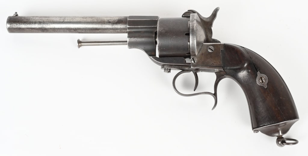 SPANISH COPY LEFAUCHEUX MODEL 1854 PINFIRE REVOLVR: SERIAL 2938. BARREL 6". CALIBER .12MM. BARREL STAMPED TUBIA 1862. The Lefaucheux Model 1854, the first revolver to use self-contained metallic cartridges rather than loose powder,ball, and percussion 